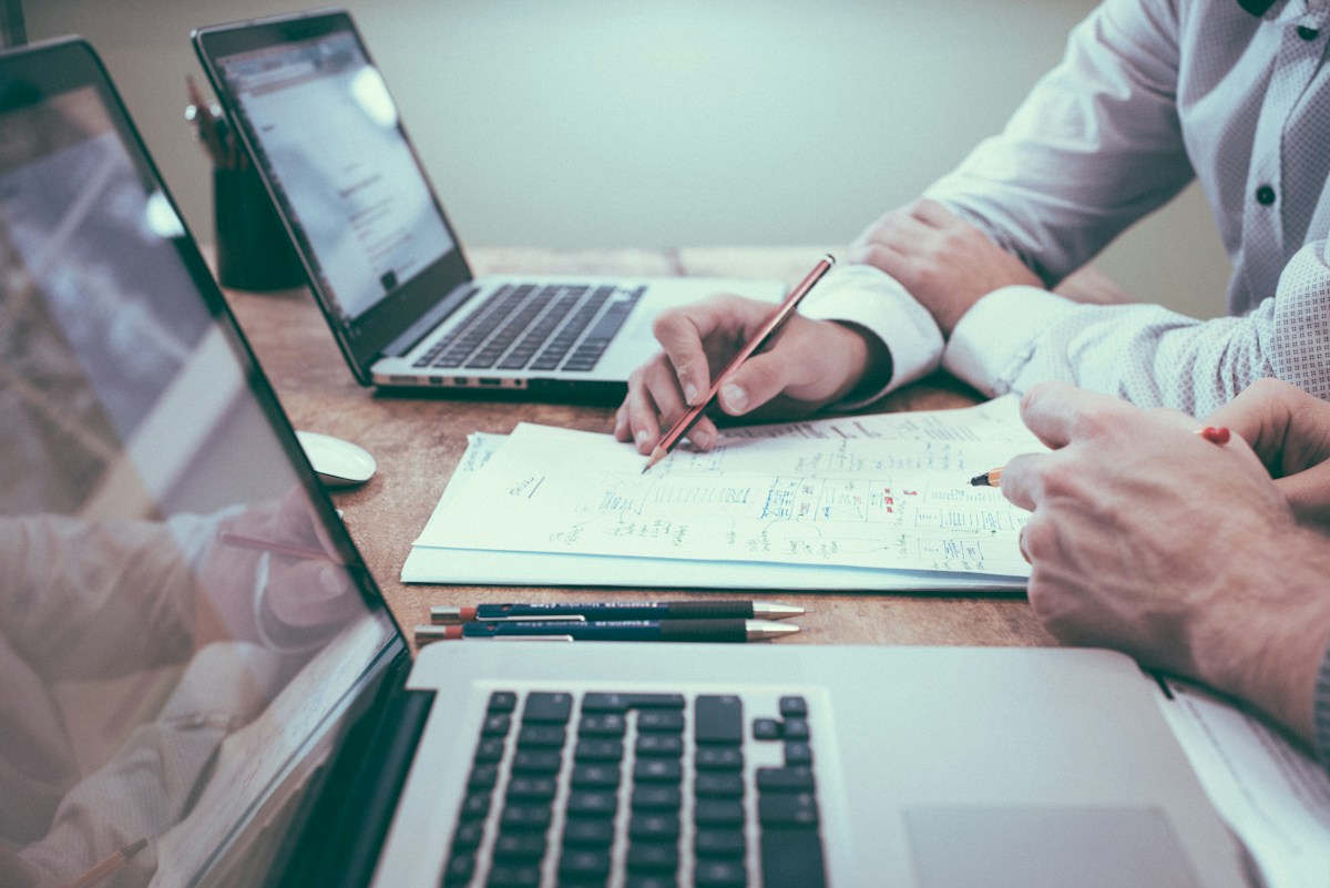 Business professionals reviewing documents